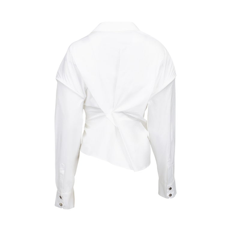 White shirt with black button details