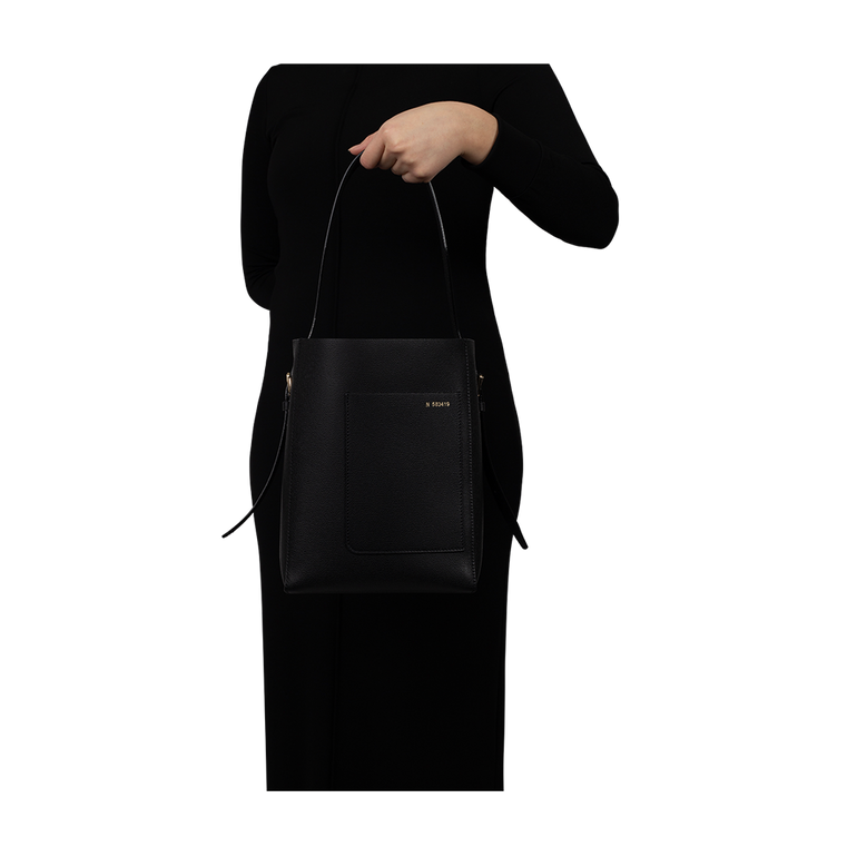 Small Black Bucket Bag | On-Model view of Small Black Bucket Bag VALEXTRA
