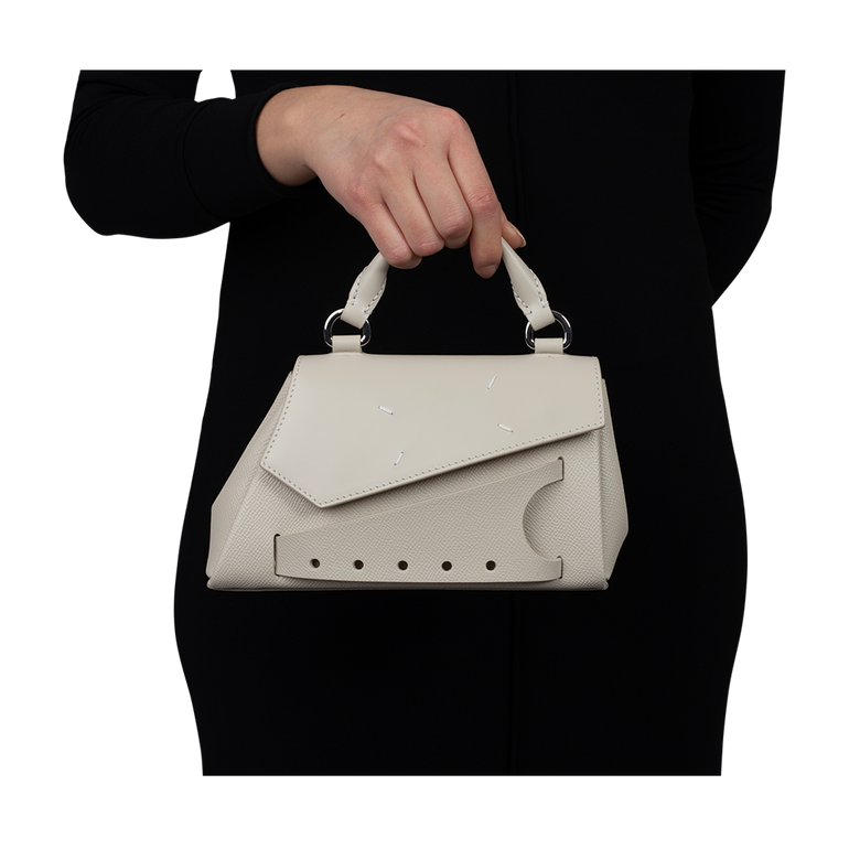 Micro Asymmetric Top-Handle Bag | On-Model view of Micro Asymmetric Top-Handle Bag MAISON MARGIELA