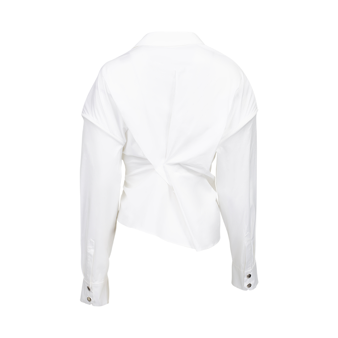 White shirt with black button details