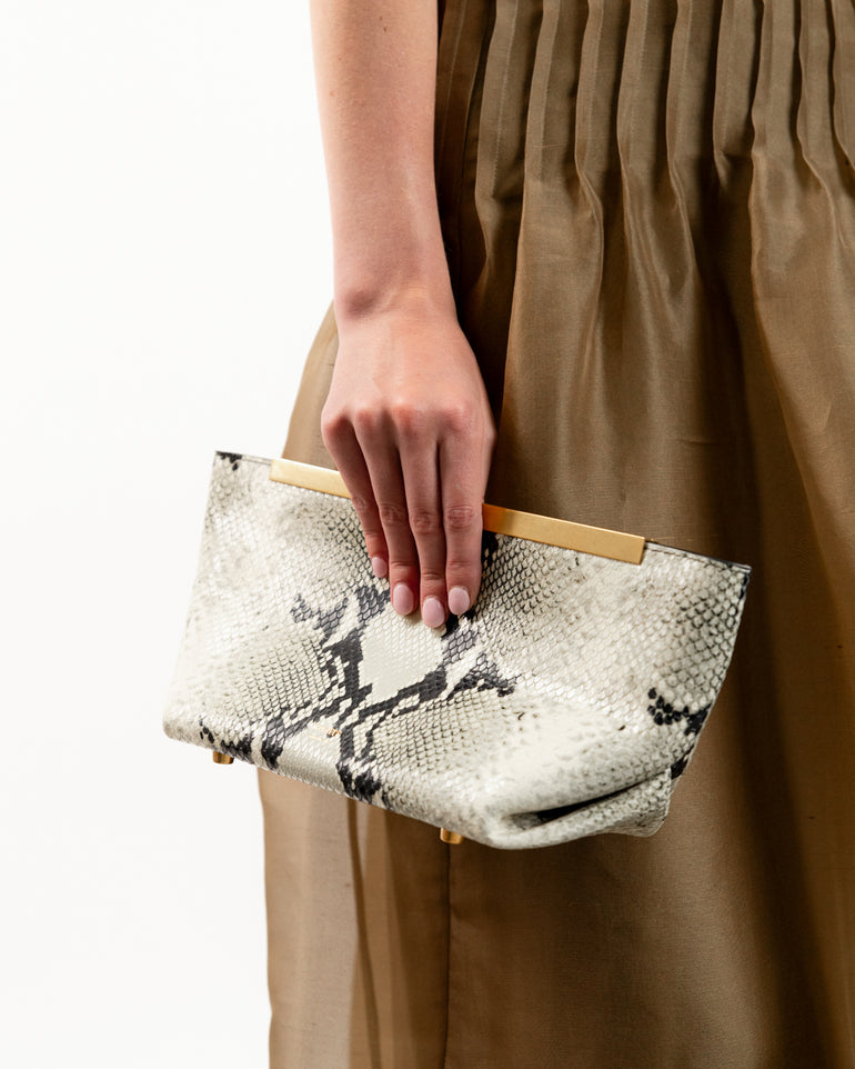 Aimee Python-Embossed Clutch Bag | Close-up view of Aimee Python-Embossed Clutch Bag KHAITE